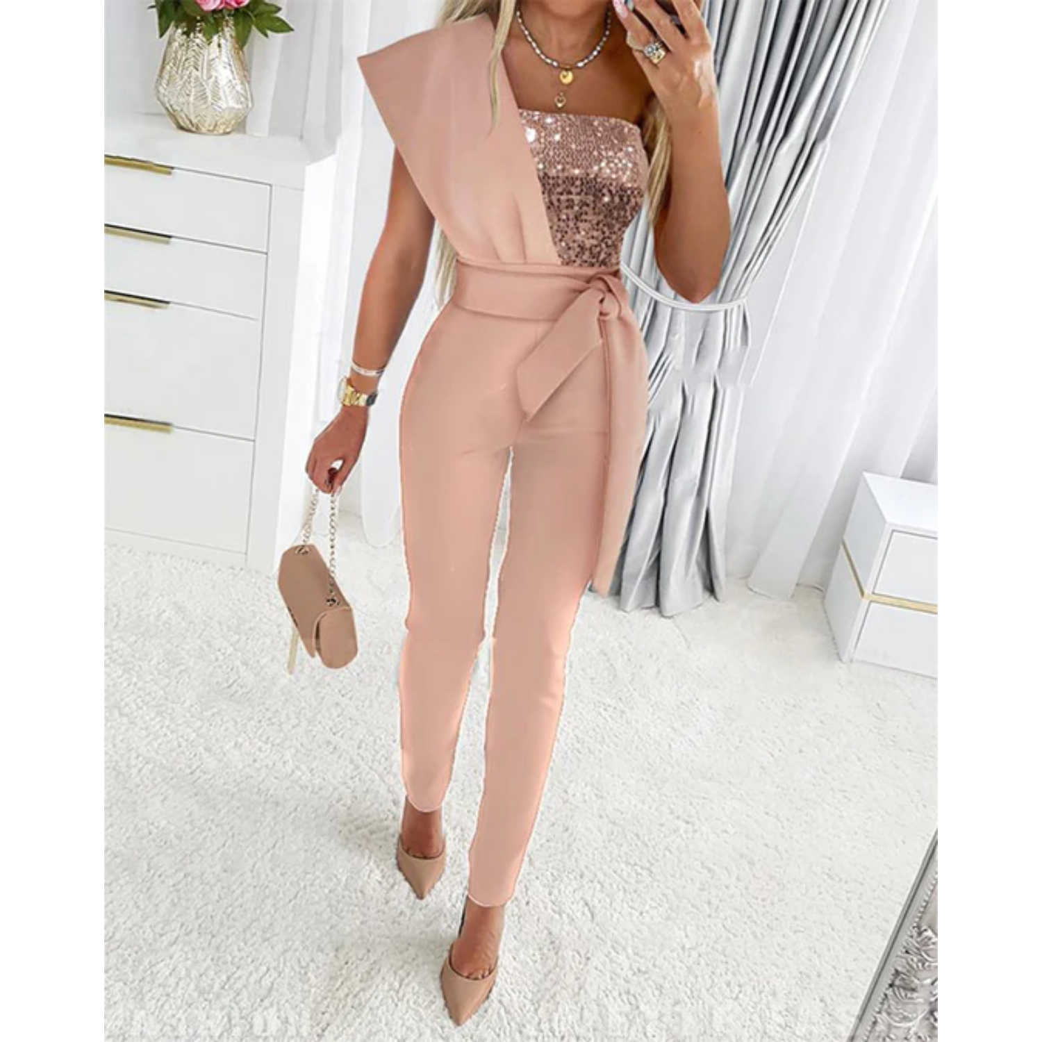 Elegante glitter jumpsuit met strikdetail