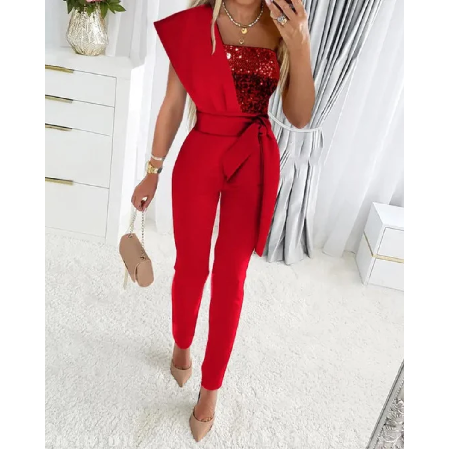 Elegante glitter jumpsuit met strikdetail