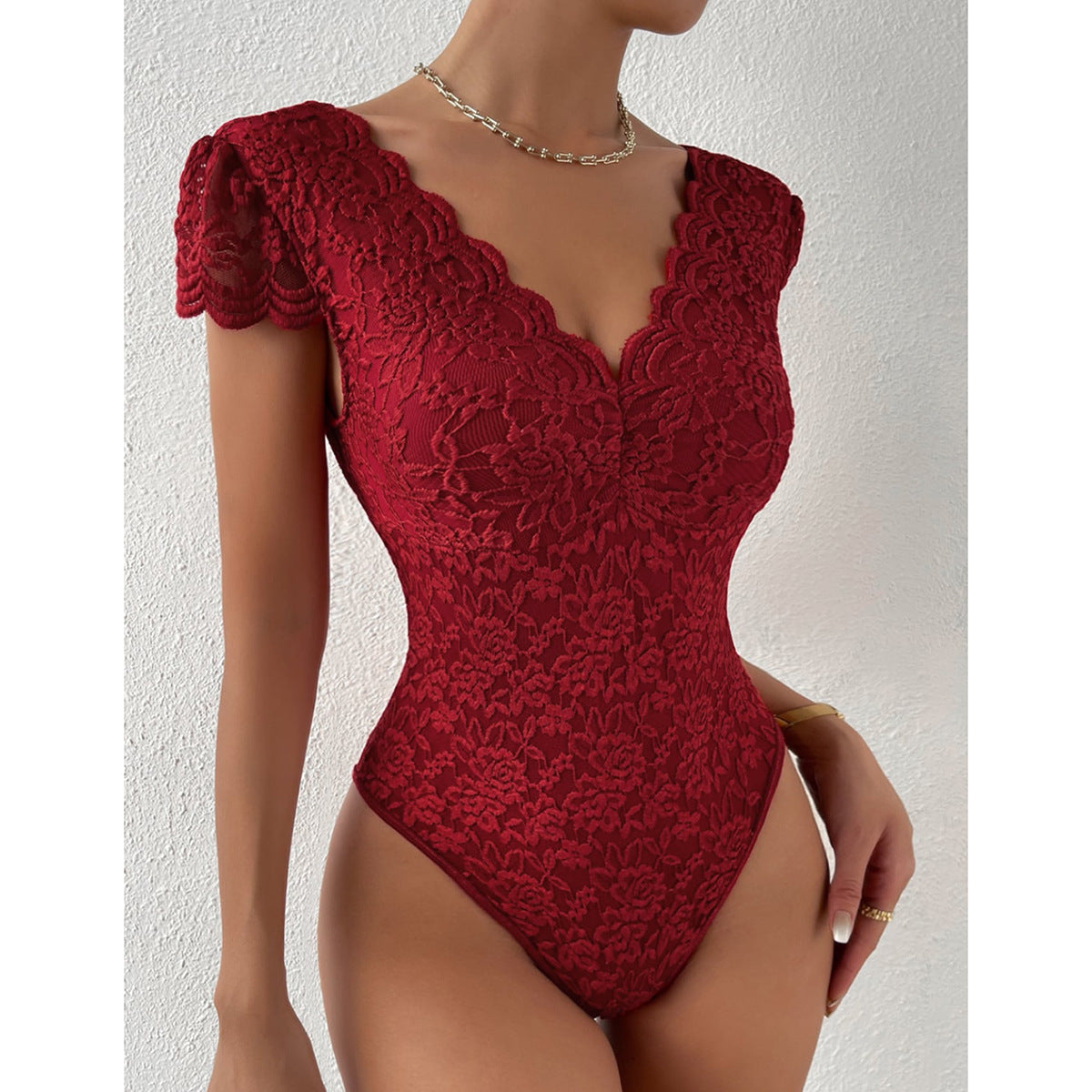 Maeve - Elegante Body Suit met Kanten Mouwen en V-hals