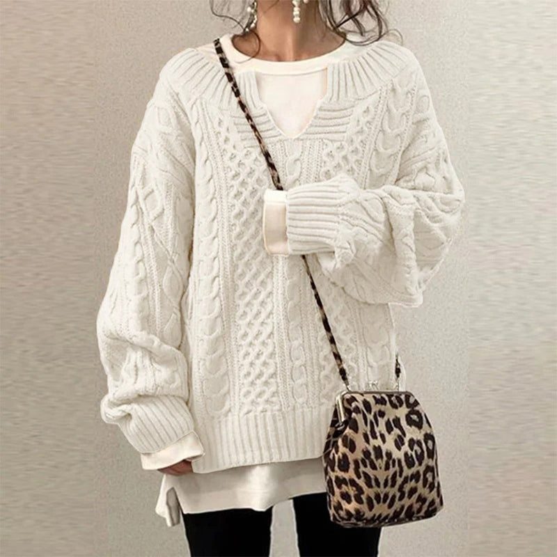 Oversized gebreide trui met unieke kabelpatroon