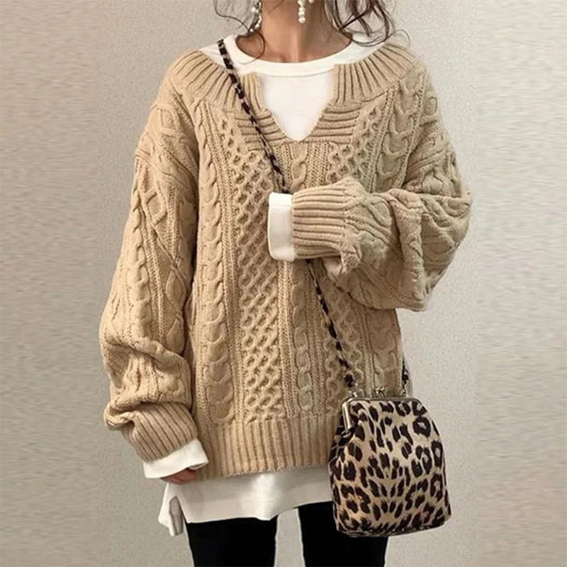 Oversized gebreide trui met unieke kabelpatroon
