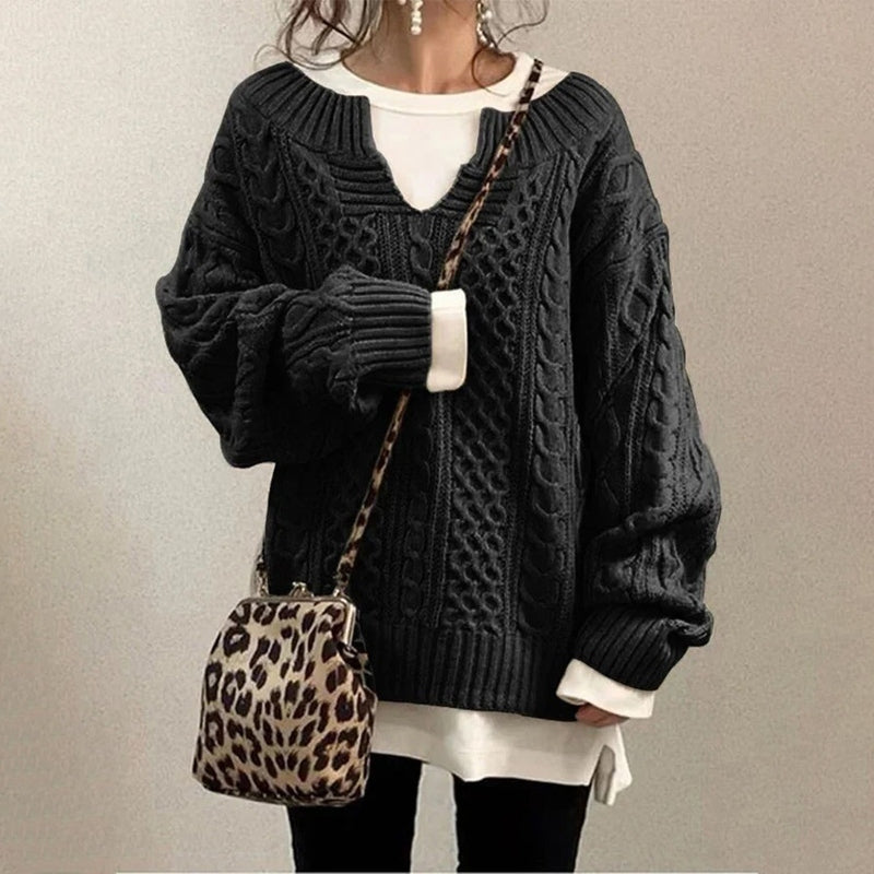 Oversized gebreide trui met unieke kabelpatroon