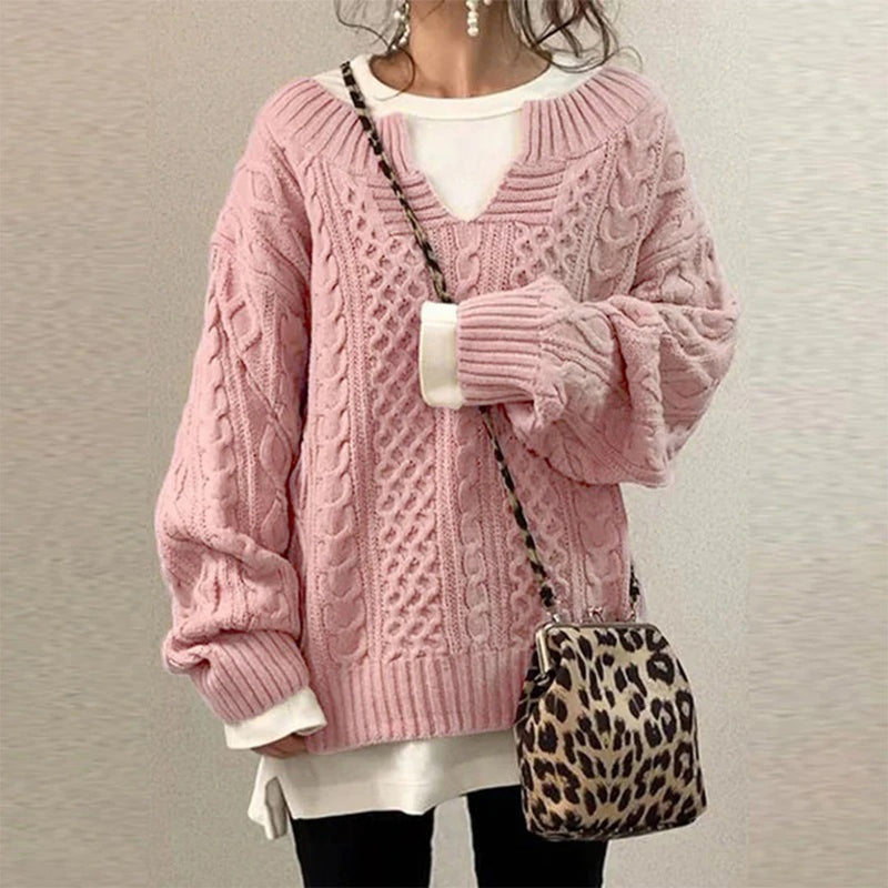 Oversized gebreide trui met unieke kabelpatroon