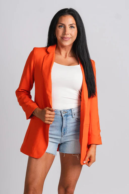 Oranje blazer met manchetten